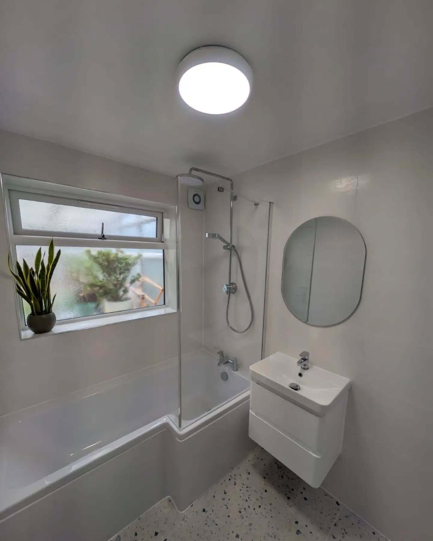 Full white bathroom with pvc walls