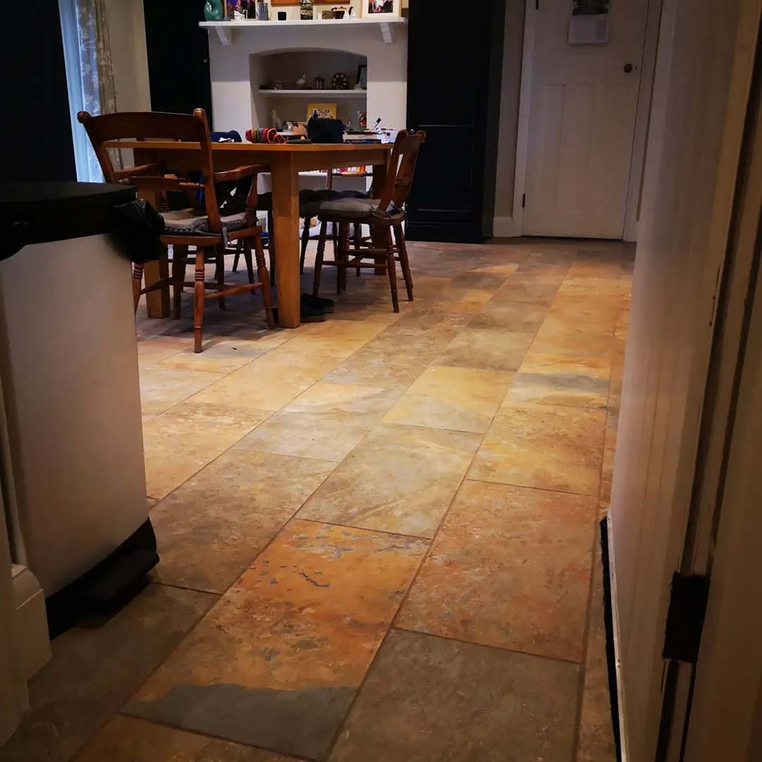 Large stone floor tiles in kitchen